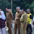 Pj Bupati Kampar dan Sekda Kampar Tinjau Lokasi Launching Beras Ulu Kasok, Lahan Pertanian dan Koperasi Tani.